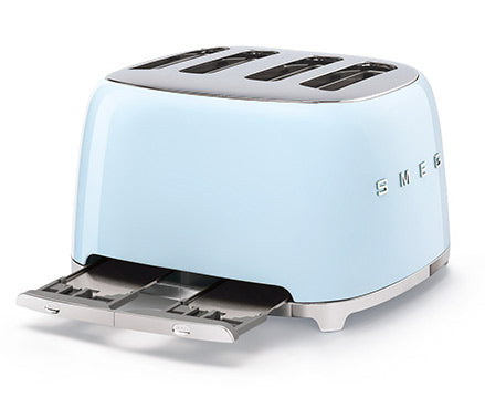 Blue Smeg toaster with crumb tray pulled out
