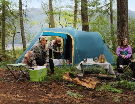 Family camping in woods