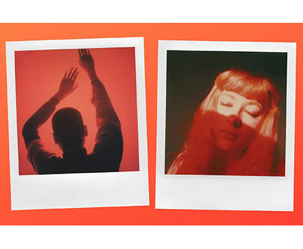 Two Polaroid photographs with red background