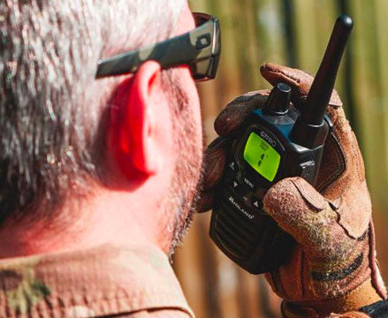 Man using walkie talkie