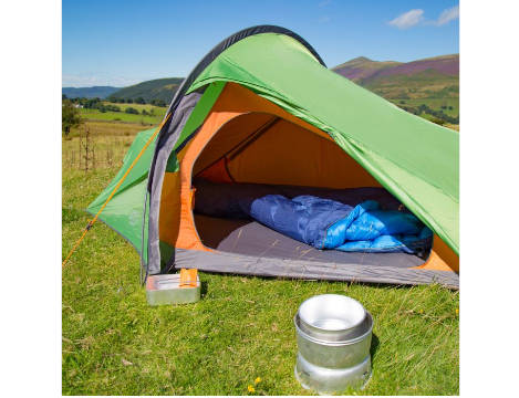 Open tent with sleeping bag inside