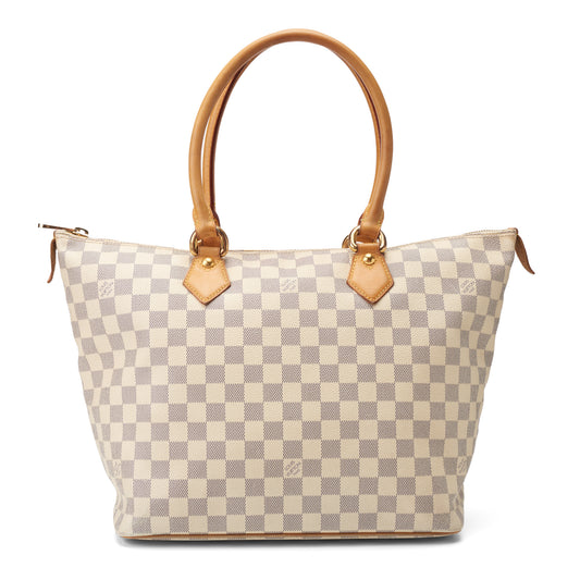 Louis Vuitton Ivory Coated Canvas Damier Azur Naviglio Shoulder Bag, the  double flaps with golden snaps, opening to two side pockets lined with  beige sold at auction on 2nd December