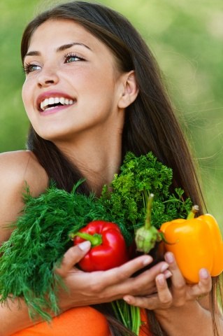 A beautyful girl with vegetables