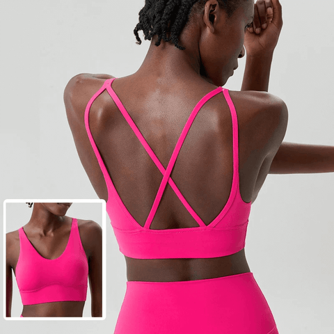 Bold Pink Workout Bra with Crisscross Straps.