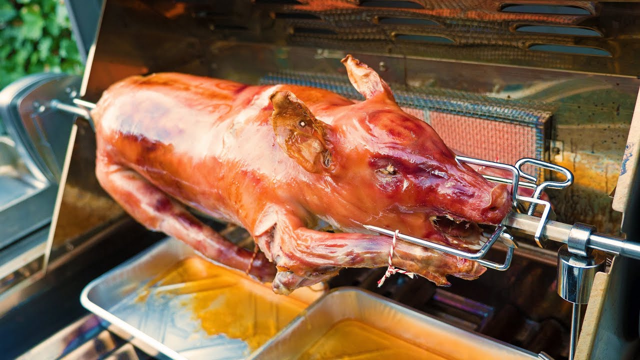 PREPARING A PIG FOR COOKING