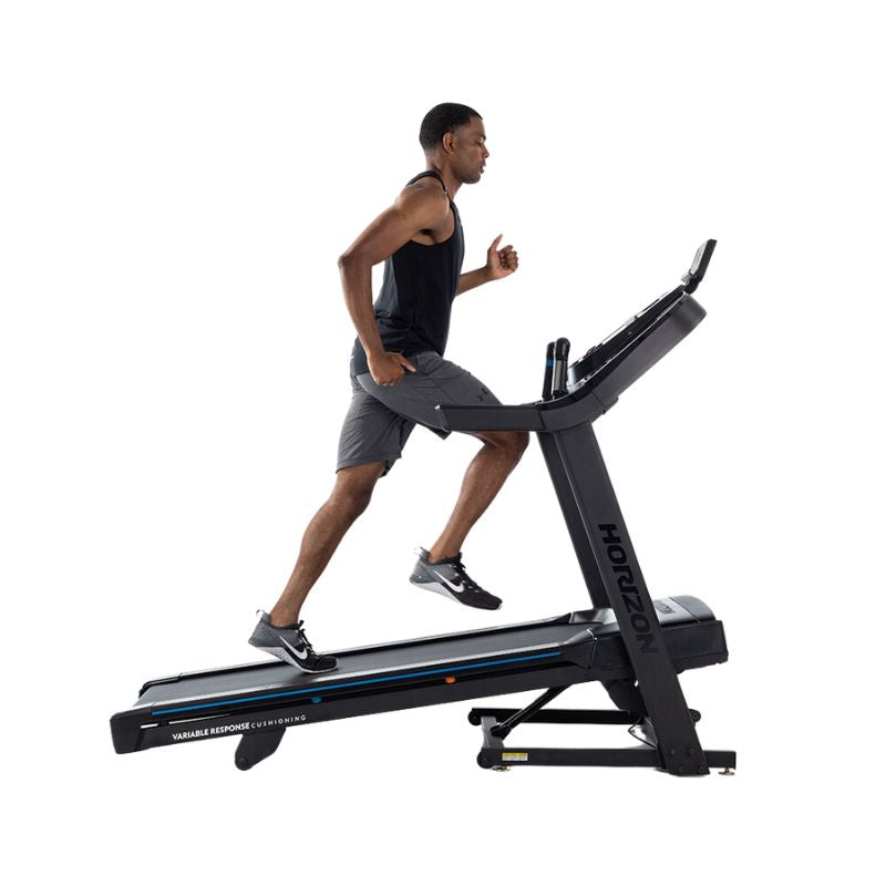 Horizon Fitness 7.0AT Treadmill - Man Running on incline