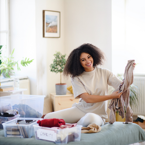 Women de-cluttering her home