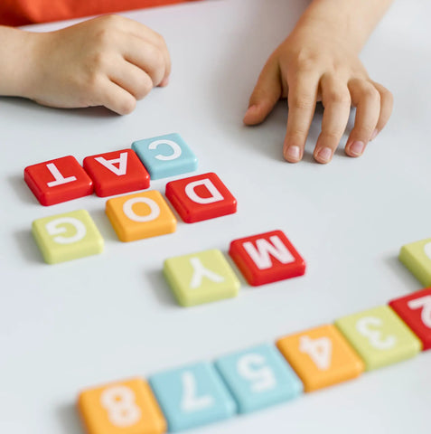 close-up-hands-making-words