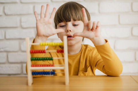 front-view-child-using-abacus-learn-how-count