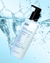 A tube of belif Aqua Bomb Hydrating Body Moisturizer falling with a splash into a pool of water