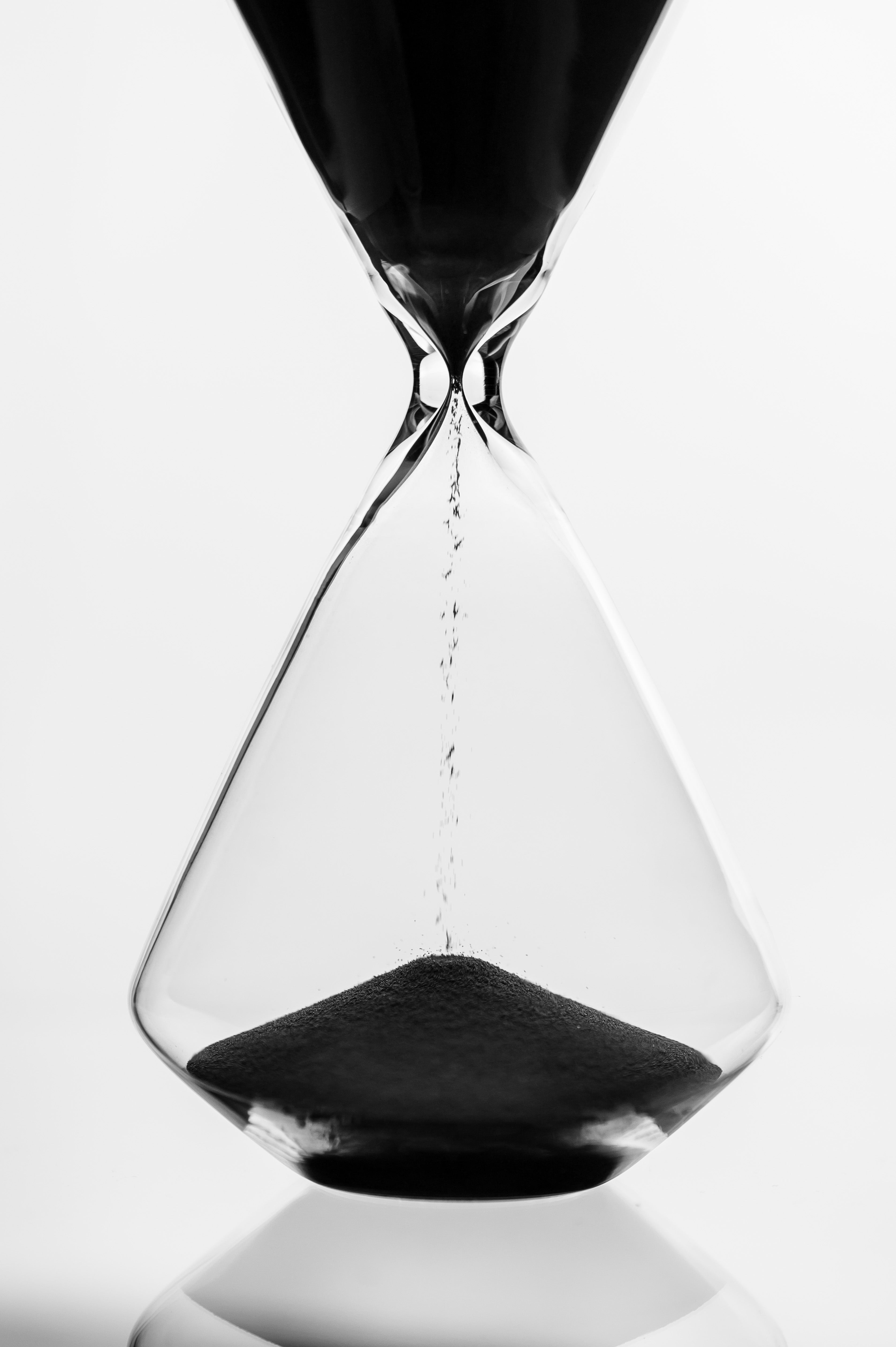 hour glass, sand dripping
