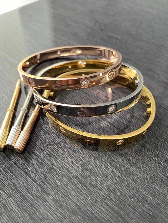 cartier love bracelet silver and gold