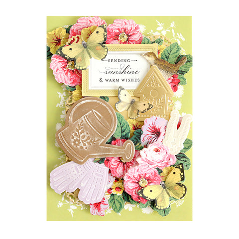 A card with flowers and butterflies on it.