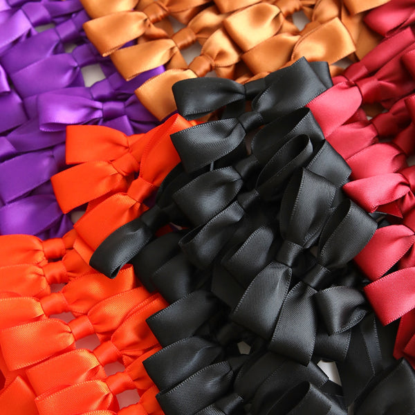 A pile of Falloween Perfect Bows.