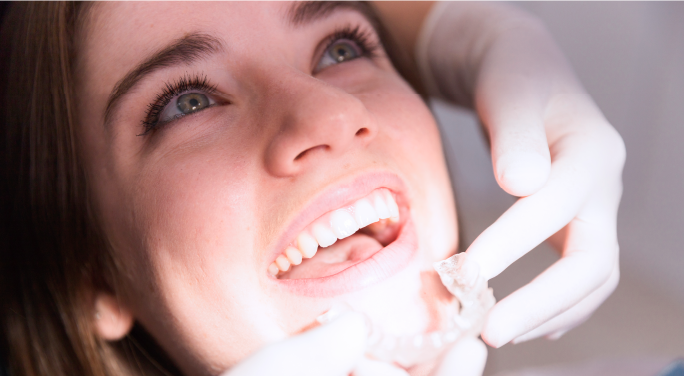 woman-smiling-at-the-dentist