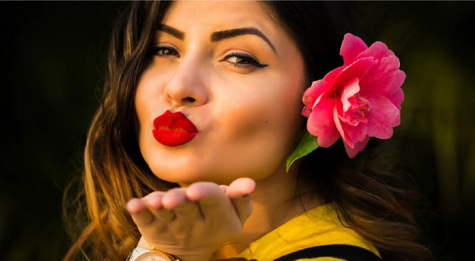 beautiful woman sending kiss