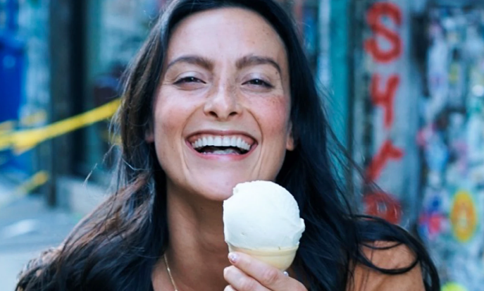 beautiful woman smiling with ice cream