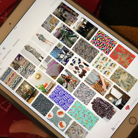 Ipad screen with Pinterest open on it.  There are 6 columns, each with multiple images which have all been pinned onto a board with an animal print related theme.