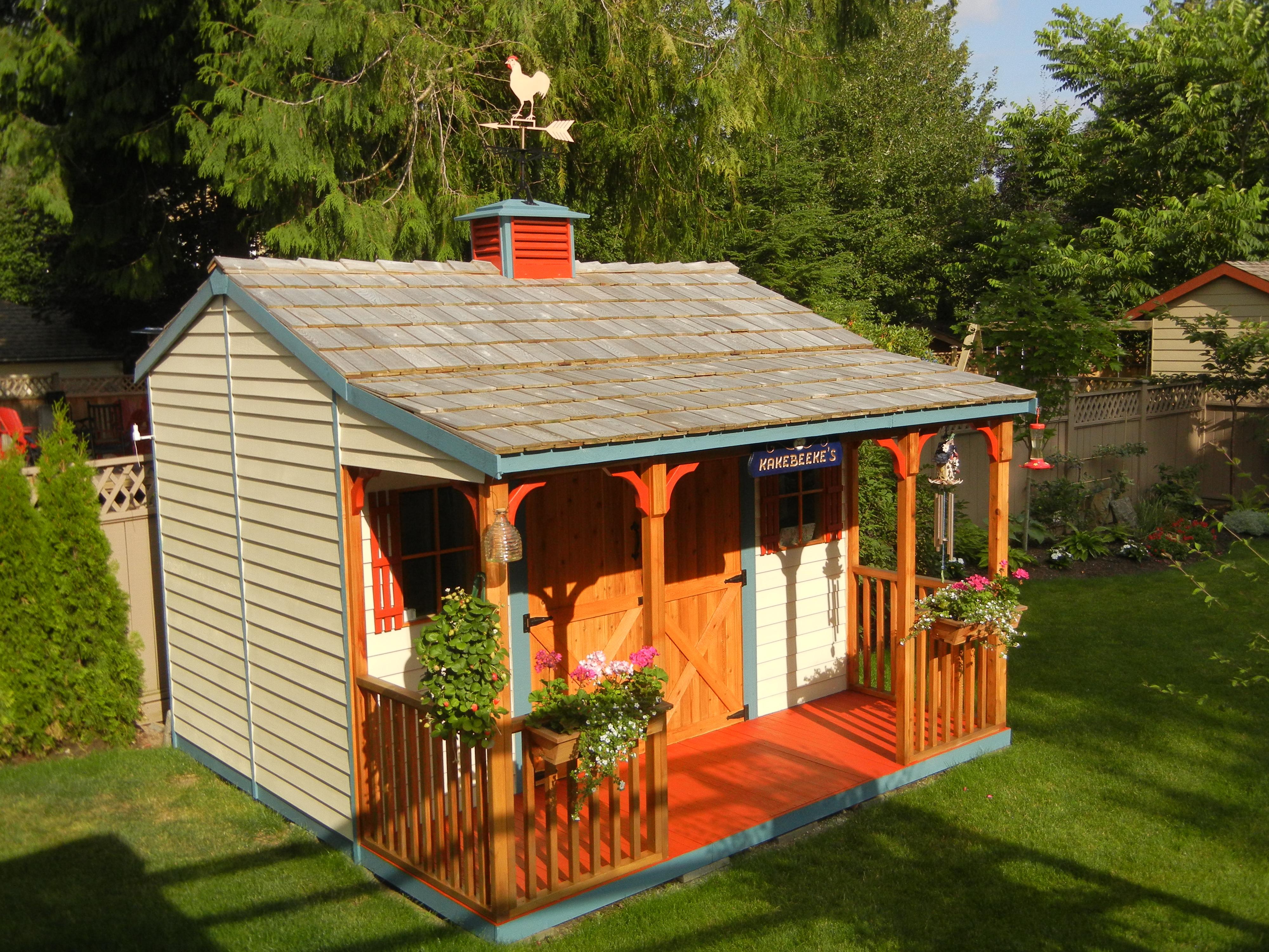garden shed with covered porch, backyard shed living space