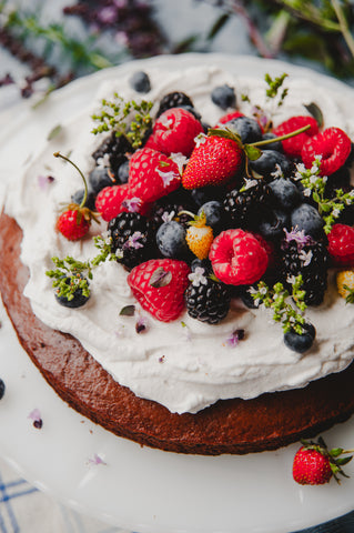 chocolate cake with coconut cream and berries