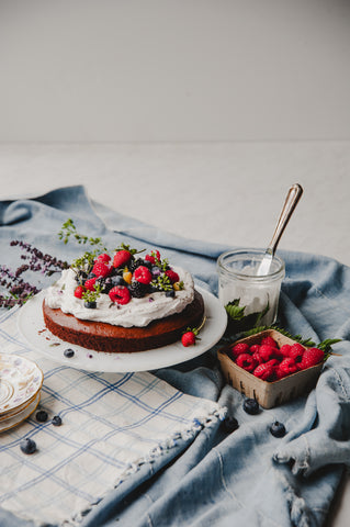 chocolate cake with coconut cream and berries