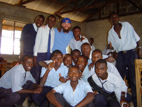 Mavuno Harvest founder Phil Hughes, with students at Miti Mingi Secondary School, 2004