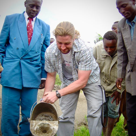Phil, found of Mavuno harvest, working with his Kenyan coworkers during his Peace Corps service