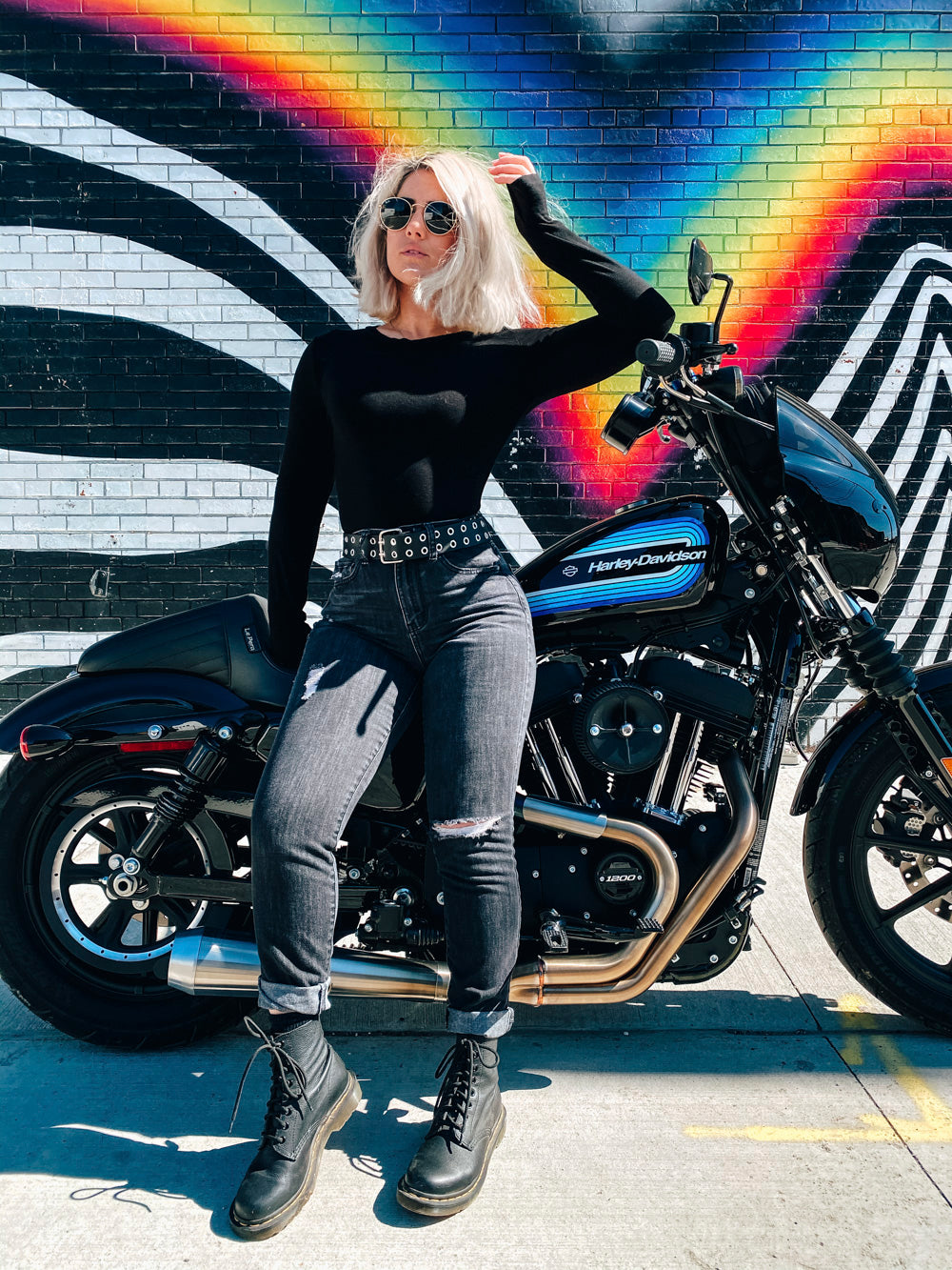 Britni de la Nuez with her Harley Davidson iron 883