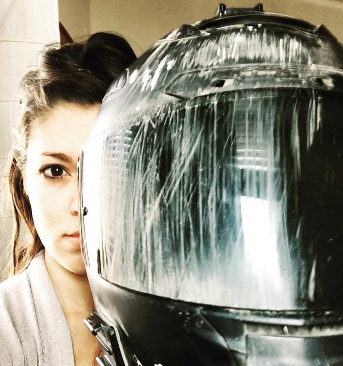 the damage to Liz's helmet after being in a motorcycle accident - moto femmes