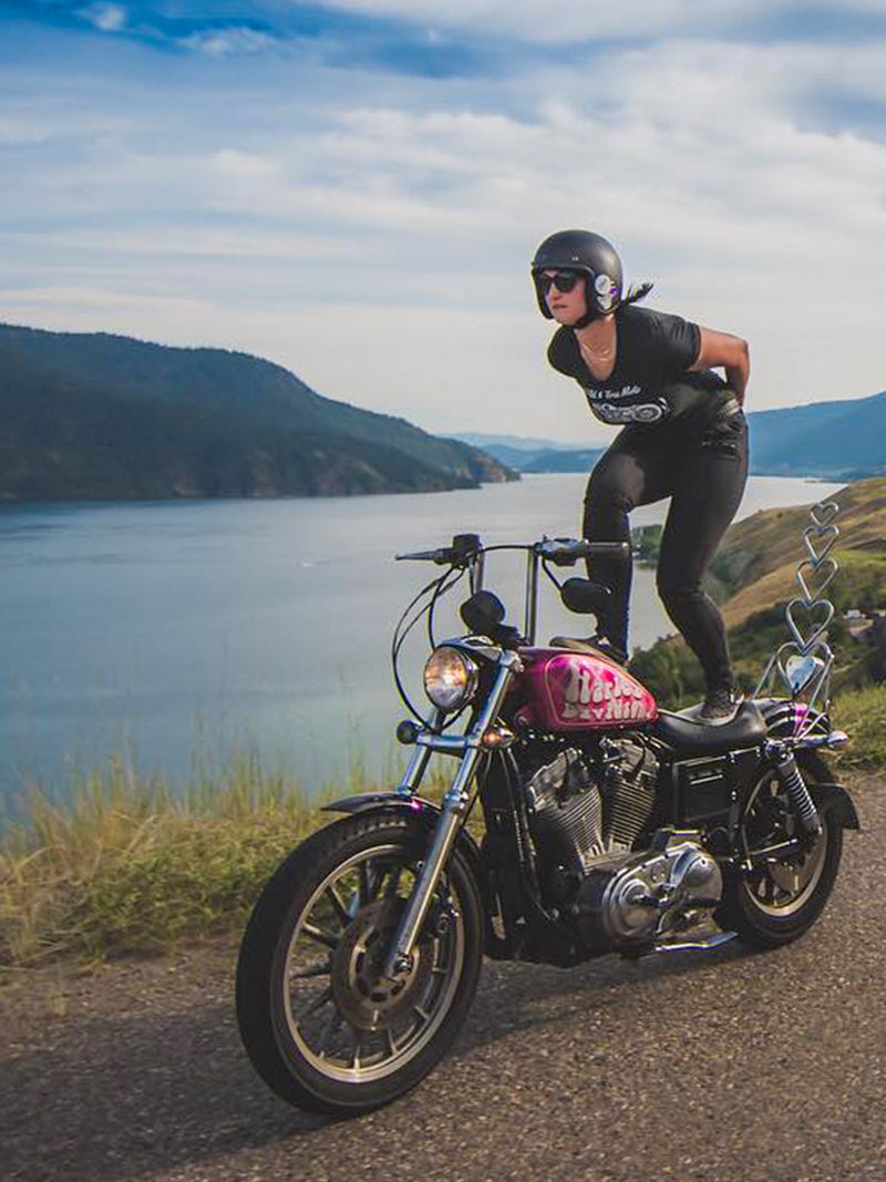 Ria moto surfing on her 883 sportster