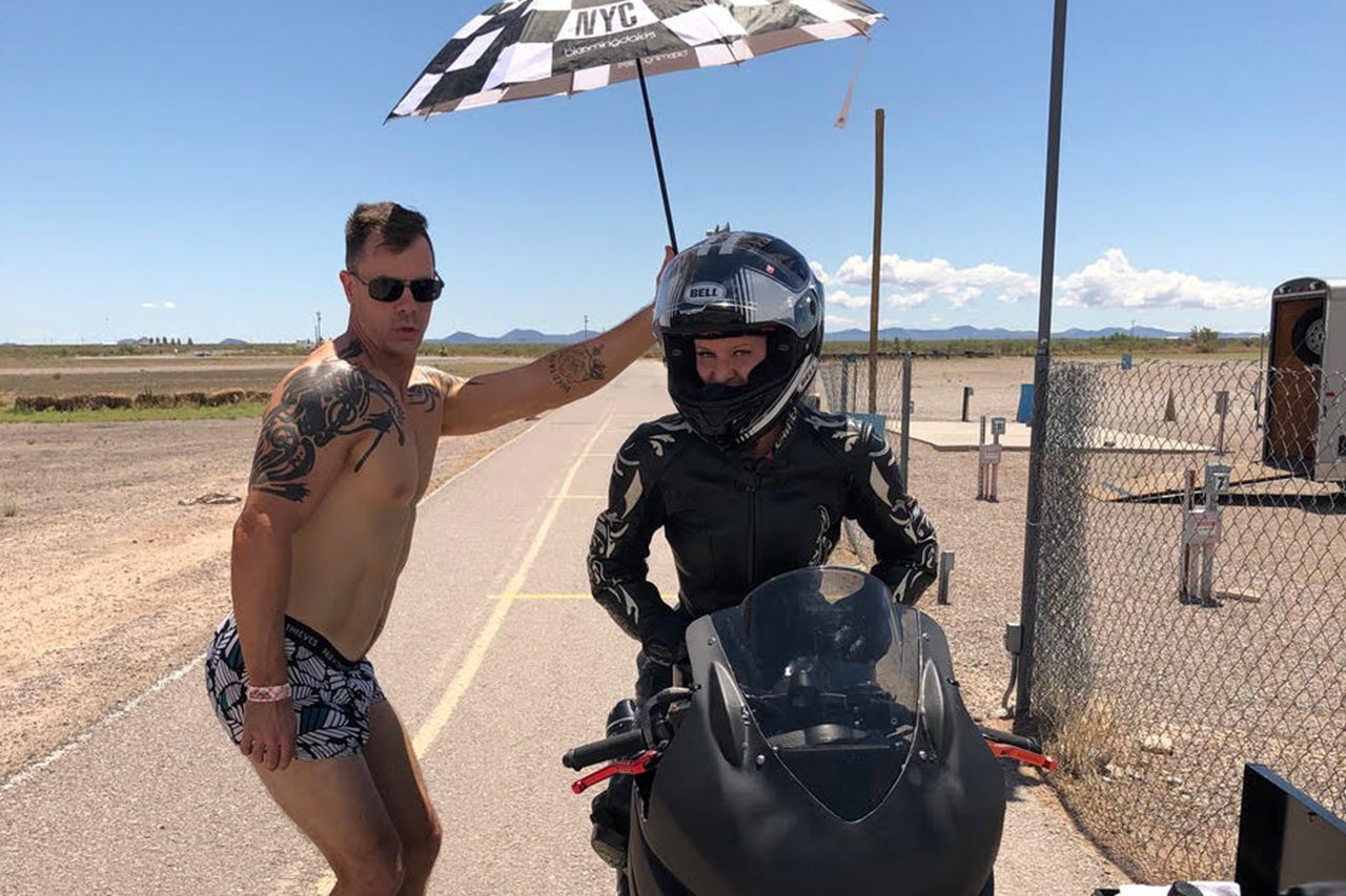My boyfriend Leif offered to be my “umbrella girl” at the Ladies Track Day, which was my first track day