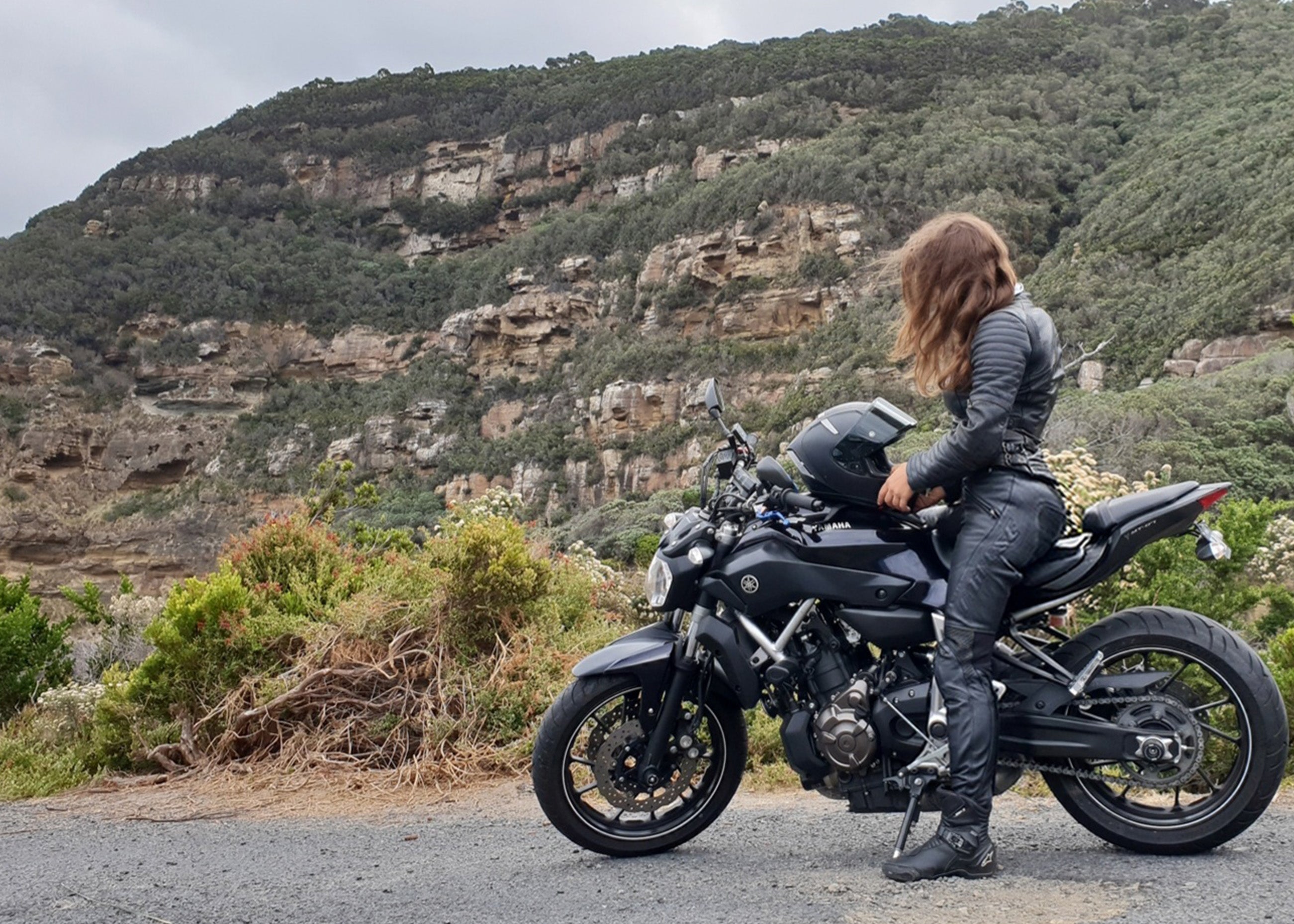 Cassie on her Yamaha motorcycle, Tasmania, Australia