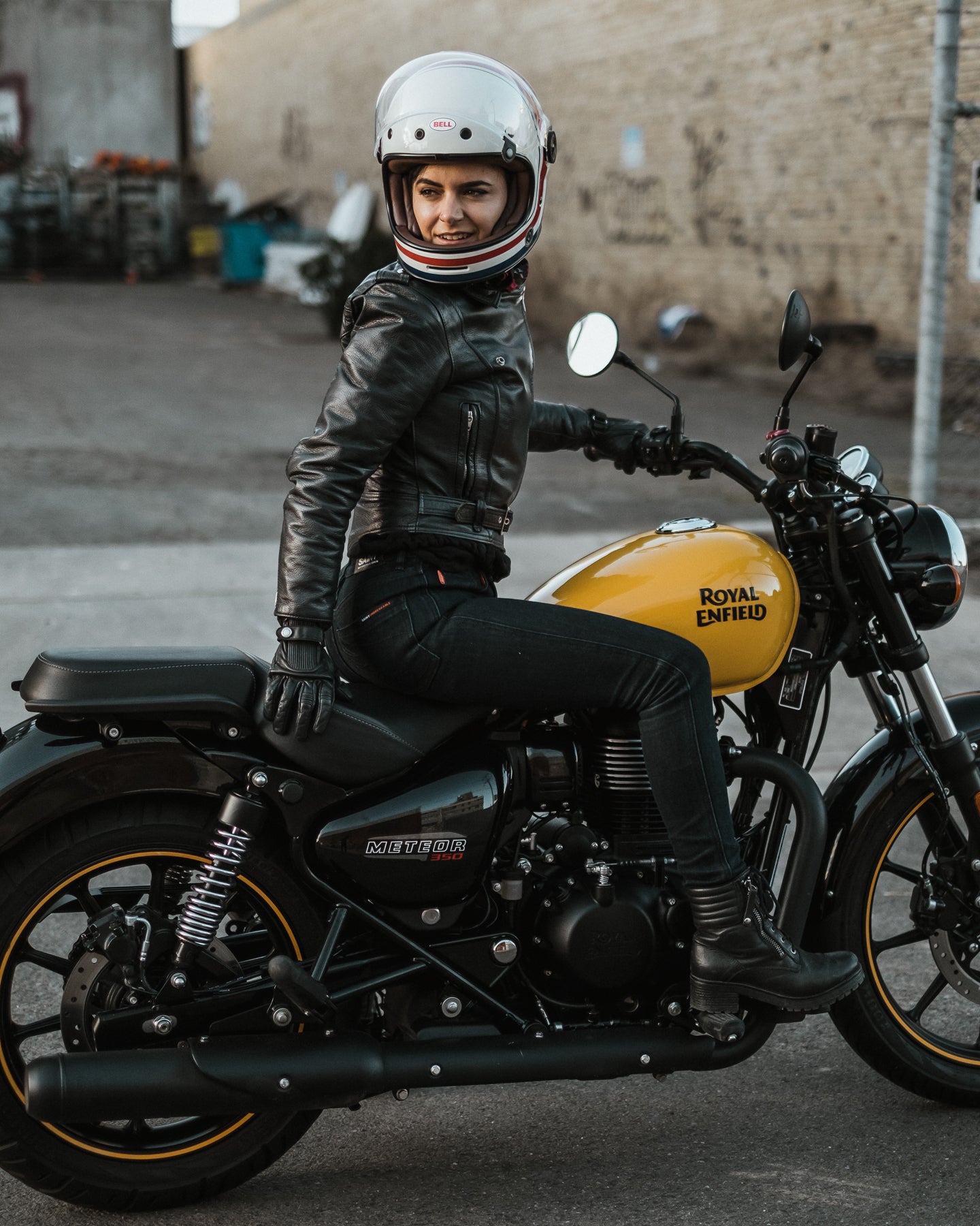 Royal Enfield family with this Fireball yellow Meteor 350