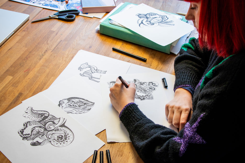 Stacey Marsh illustrating patterns in her studio