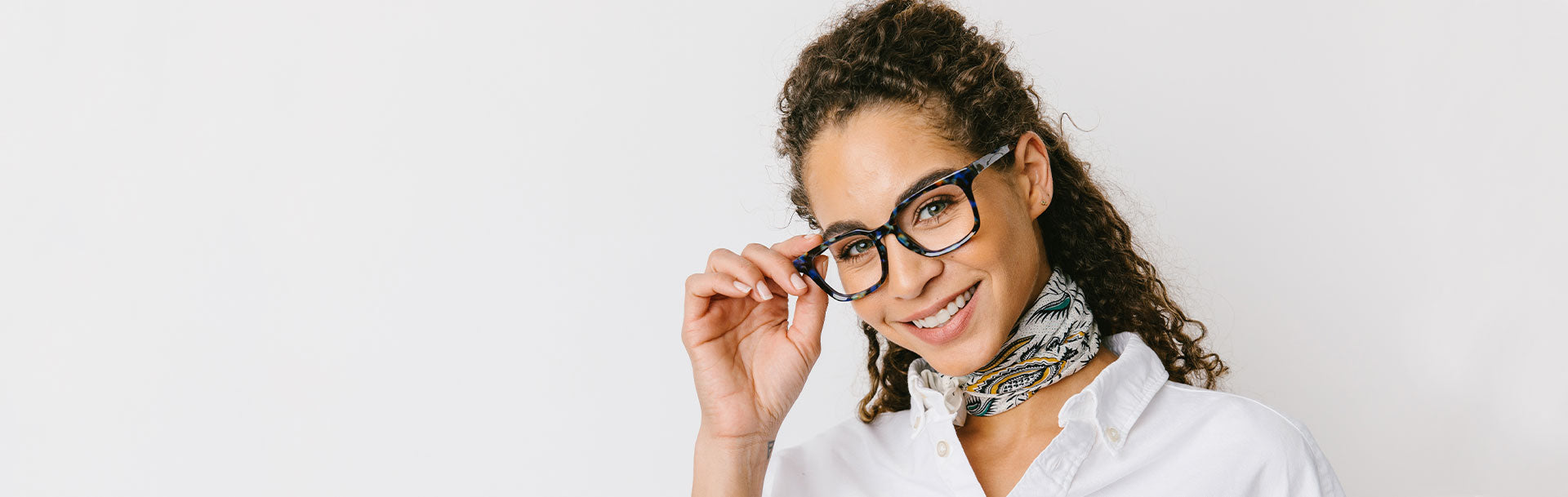 Woman Standing In Front of Plain Background Wearing Peepers Reading Glasses Bowie