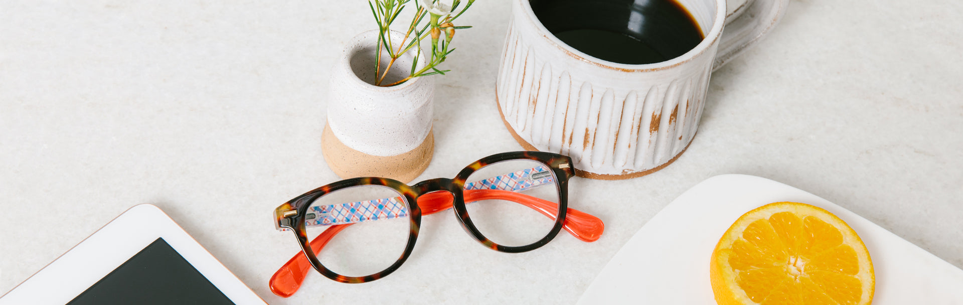 Peepers reading glasses on a breakfast table