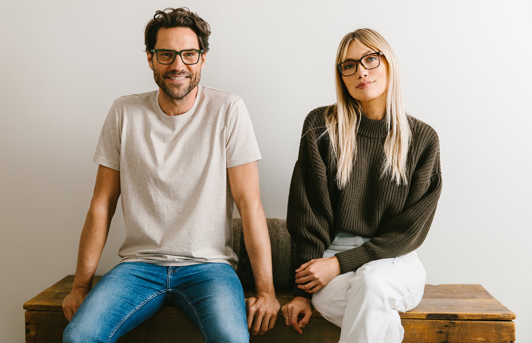Man and Woman Wearing Peepers Reading Glasses