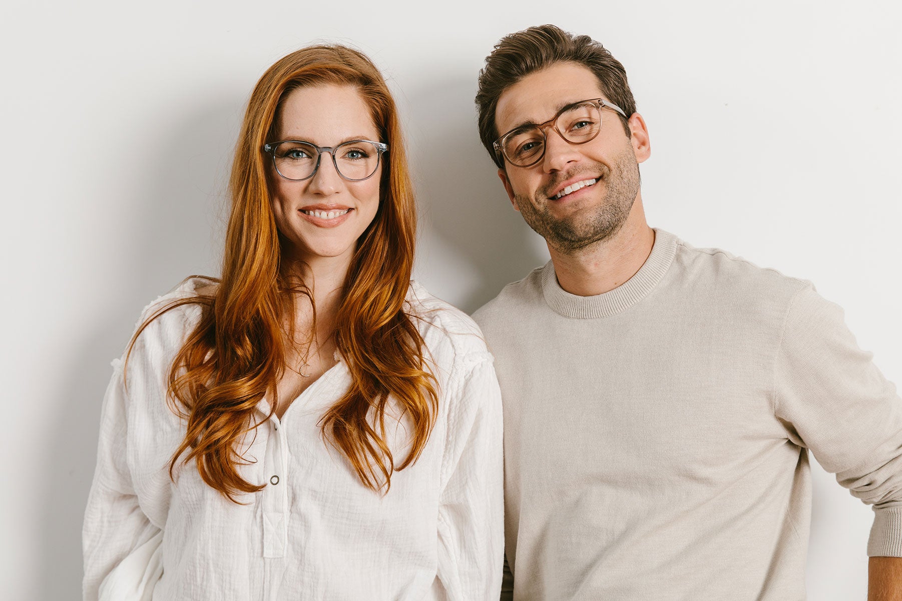 Man and Woman Both Wearing Peepers Frame Orion