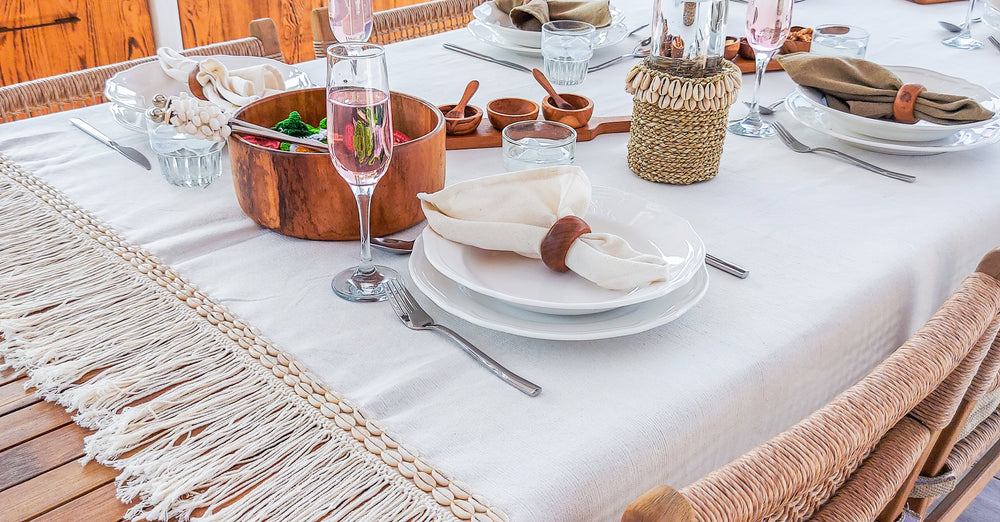 Chic_off-white_tablecloth_adorned_with_charming_shell_and_fringe_accents_–_Nisrina_-_www.zapurah.com