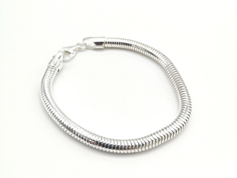 Silver snake chain bracelet on a white background