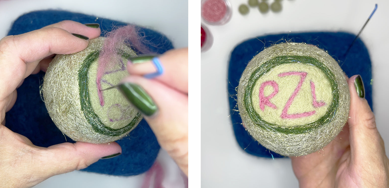 Needle felt initials into pom