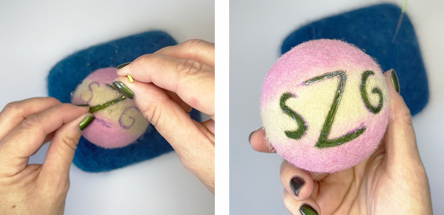 Needle felt initials into pom