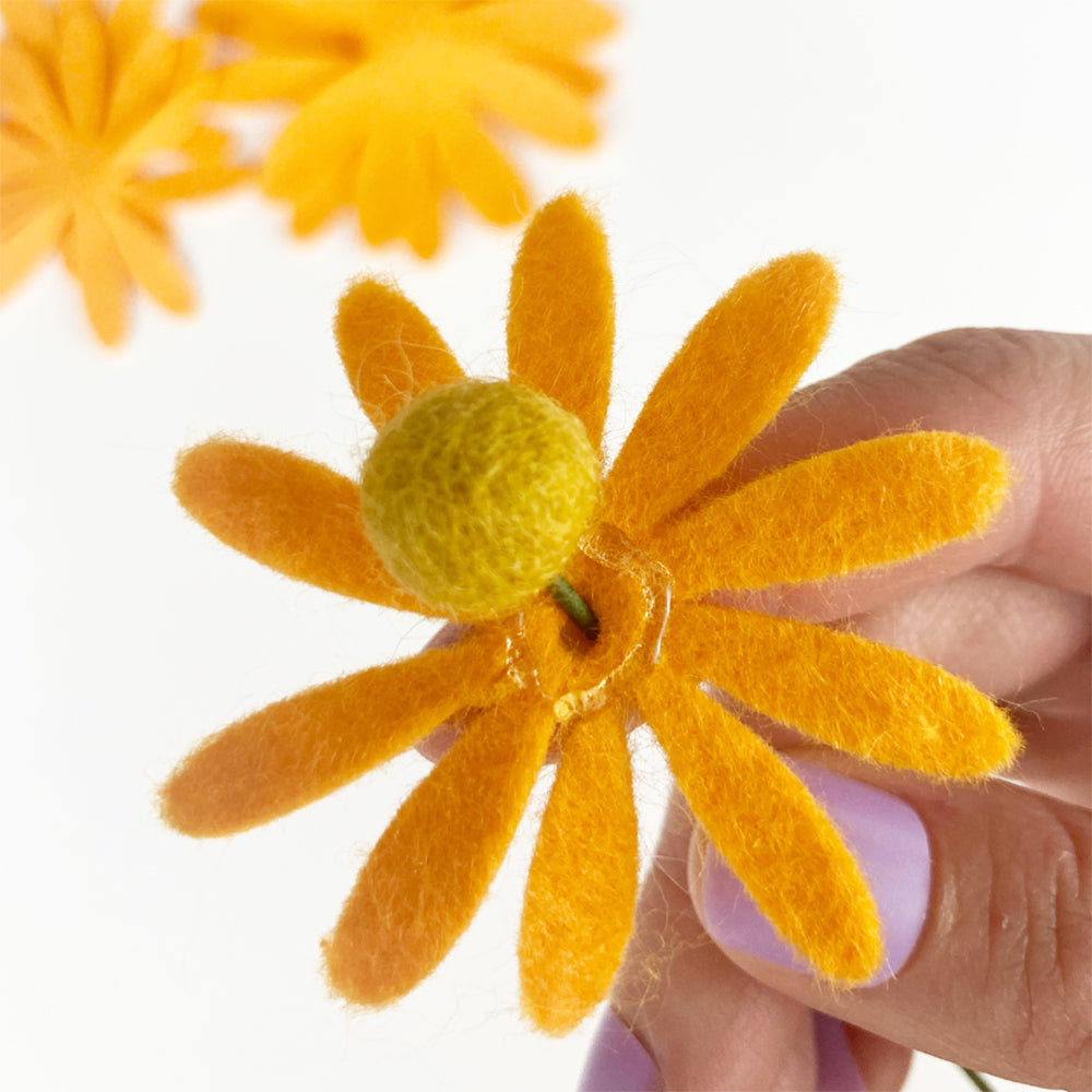 Adding first set of petals to stem