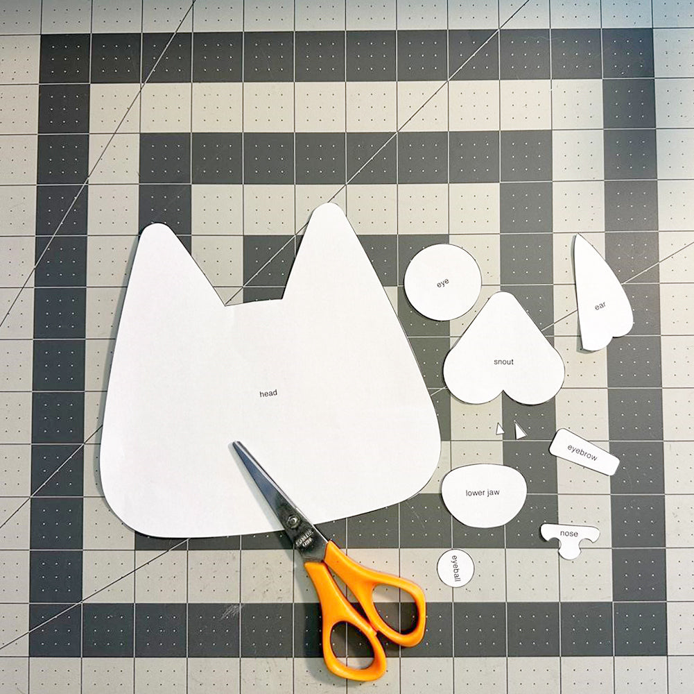 Cutting out cat pattern pieces