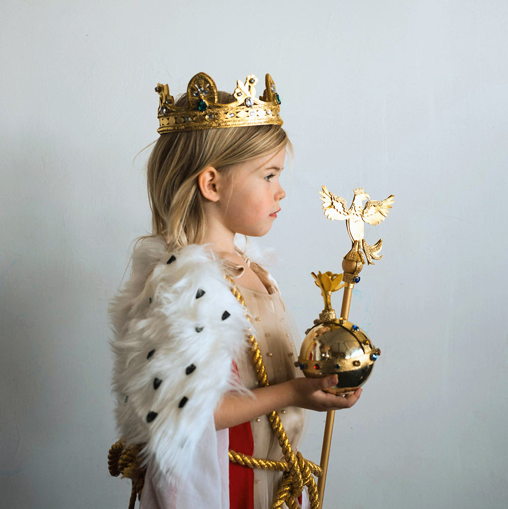 Child dressed up in crown jewels