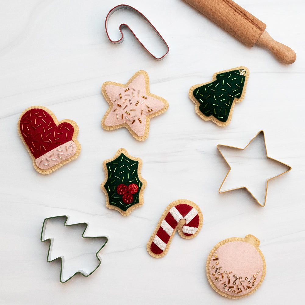 Felt cookies with cookie cutter shapes