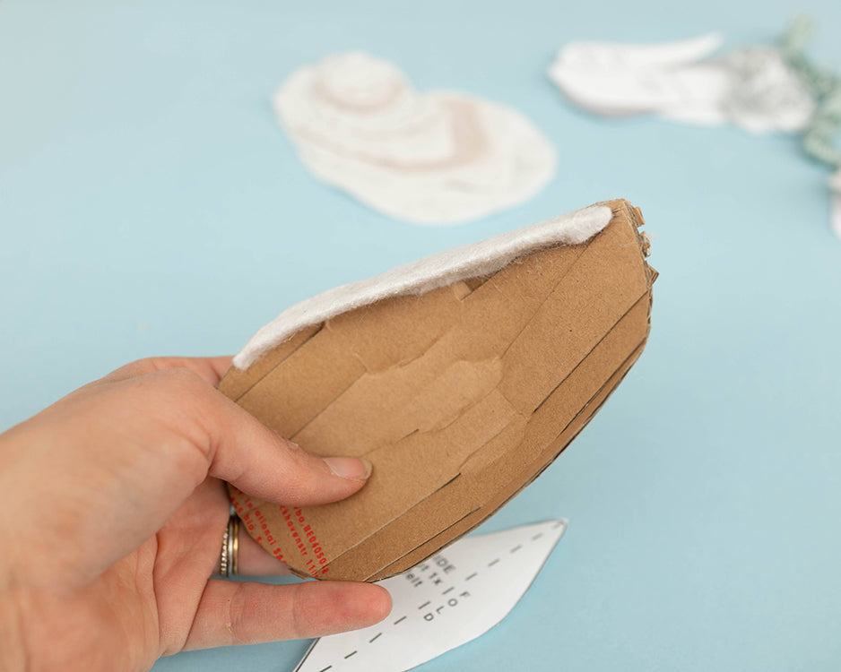 Gluing felt side to oyster shell