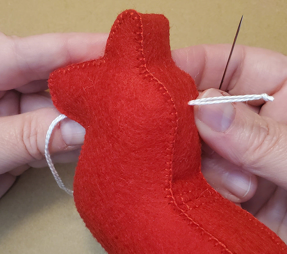 Adding harness to horse head