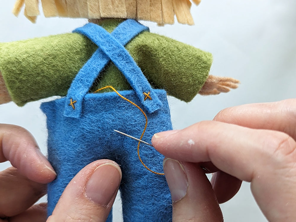 Attaching overalls to Scarecrow