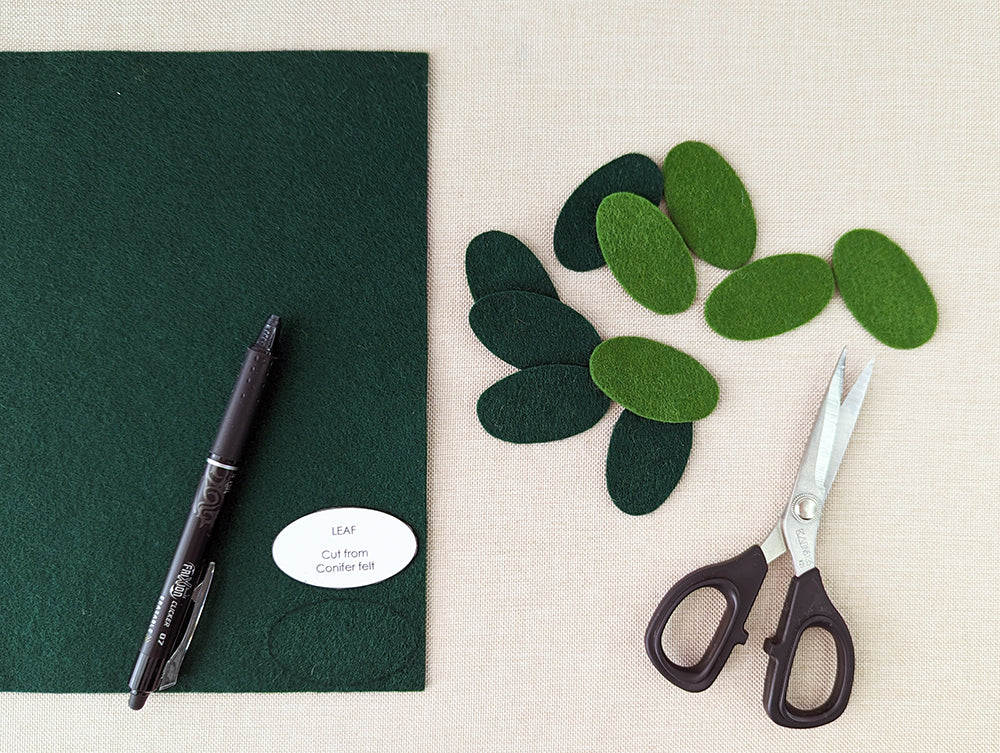 Cutting leaves from felt